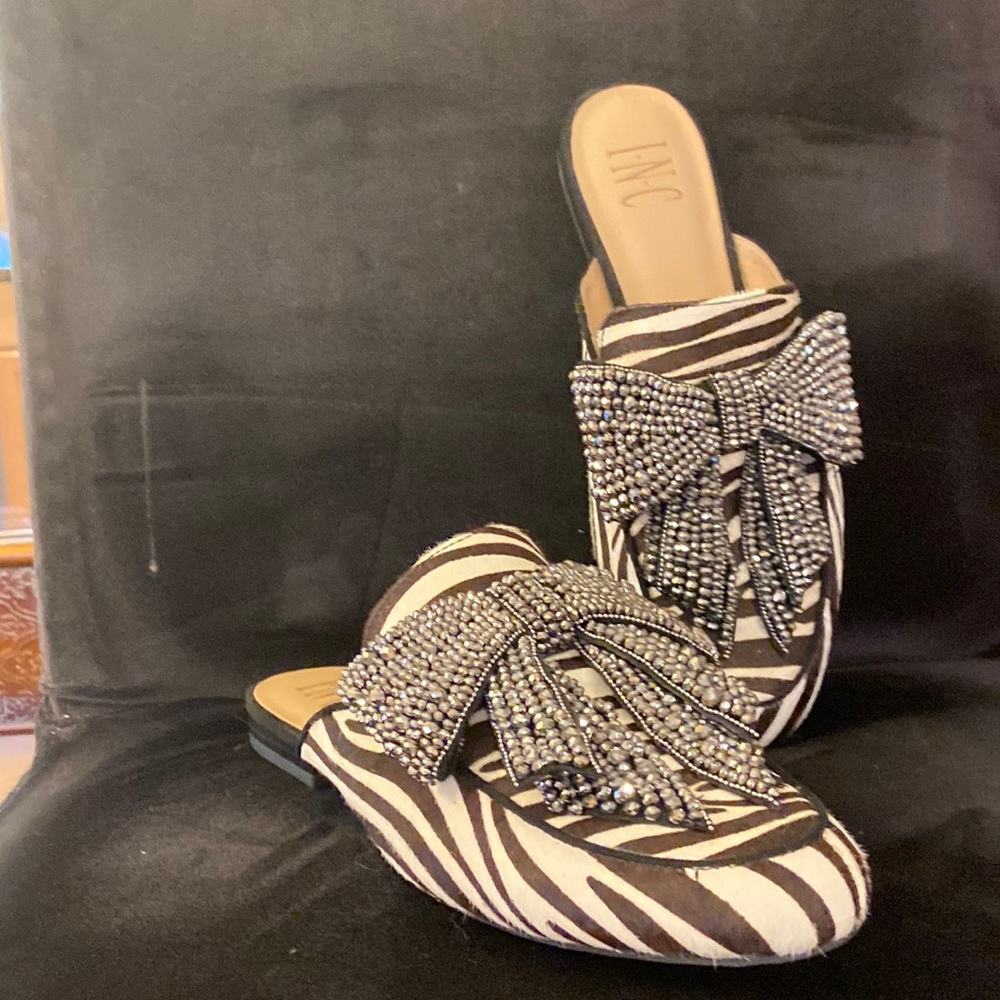 INC slip on flats. Real calf fur - size 8. Like new - never worn.